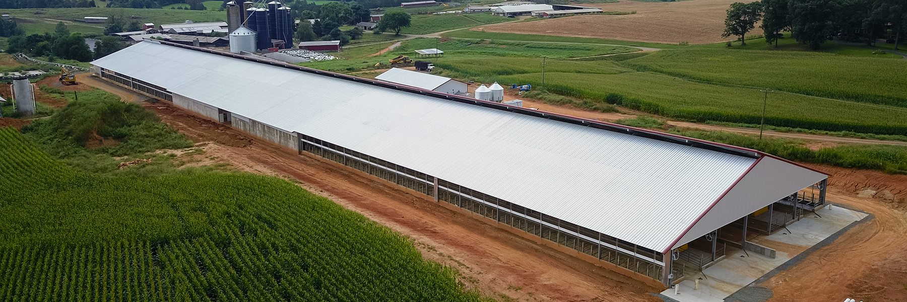Metal building with offset ridge
